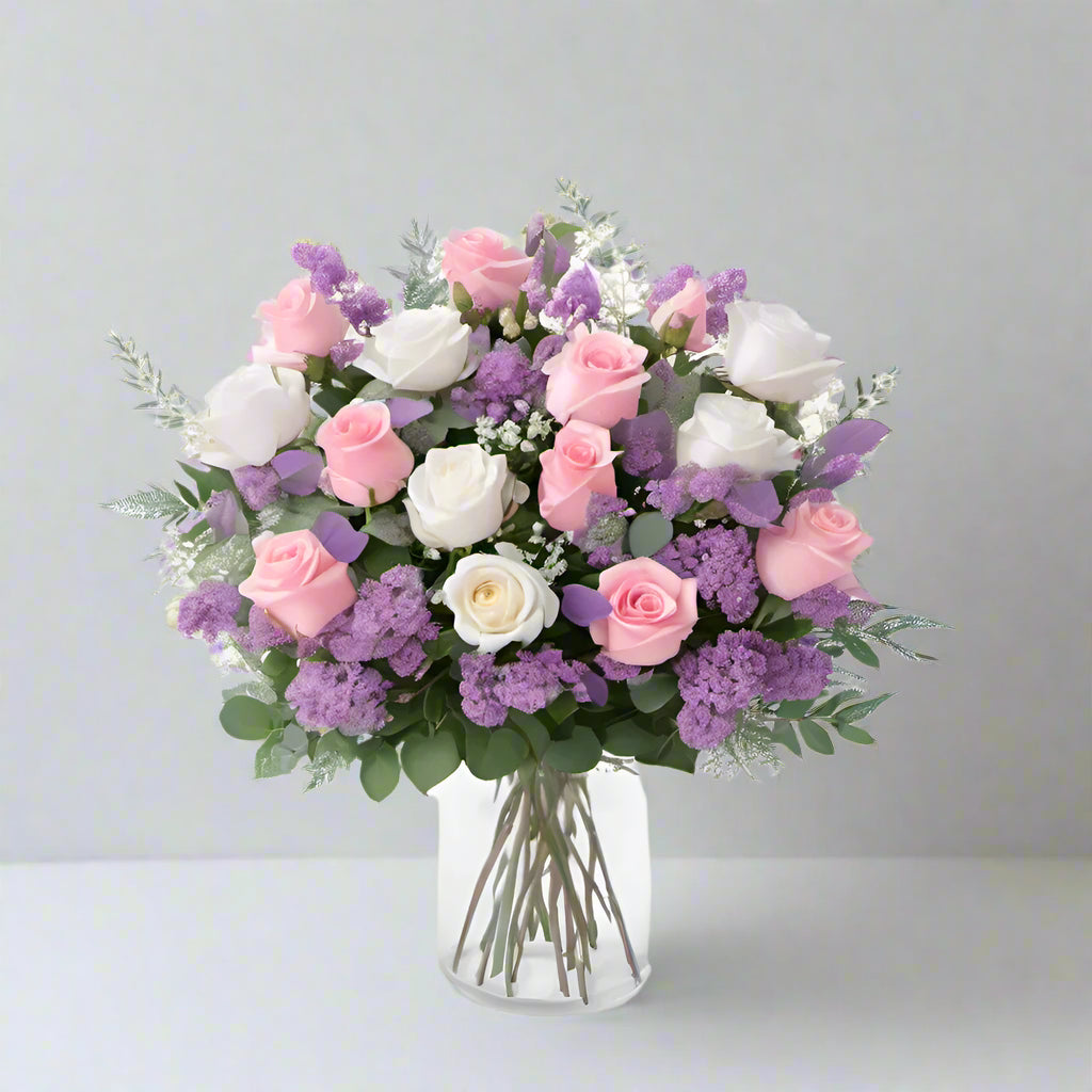 Purple, Pink, and White Roses In Vase